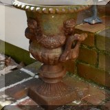 L05. Metal urn-shaped planter.